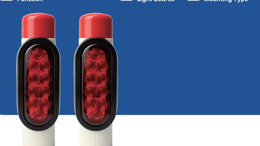 Two trailer guide posts with red LED lights and protective red caps